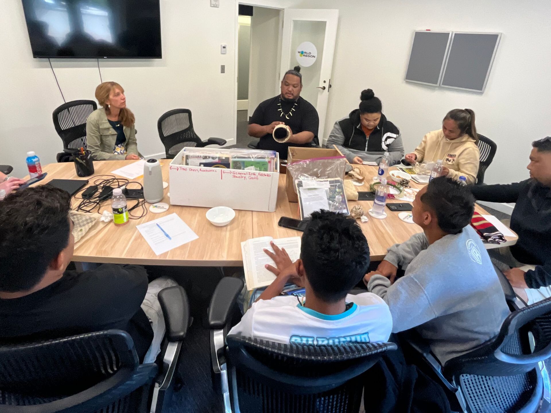 Micronesia participants at WorldOregon discussing the Micronesia Culture Box Projects for schools in Portland. 