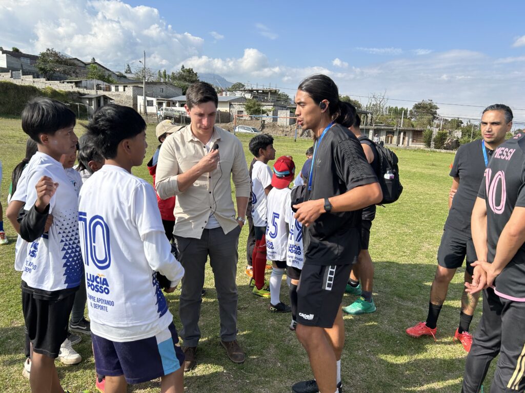 Coach Alika teaching a drill