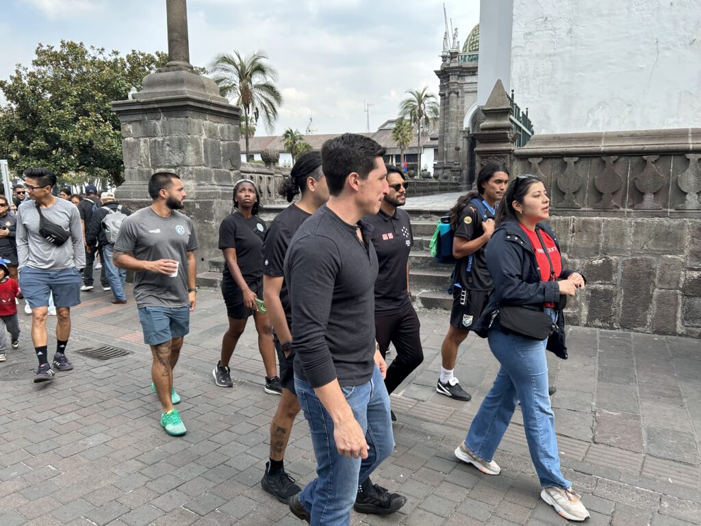 Participants learning about the history of Quito