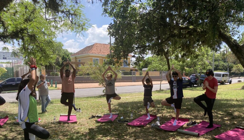 U.S. participants in Brazil practicing yoga